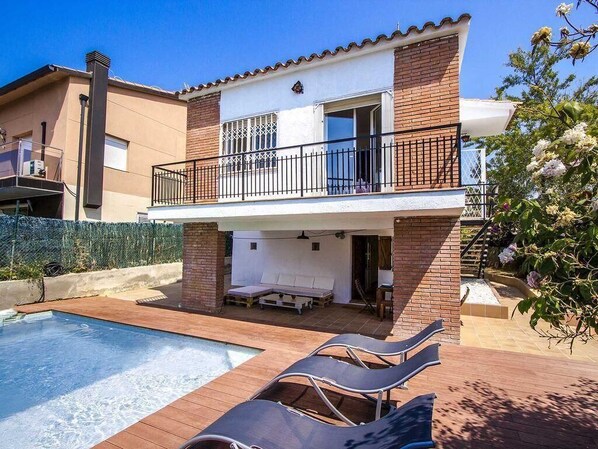 Front of the homeand Pool