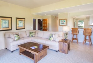 The living room is perfect for entertaining, or just relaxing on the sofa with a good book