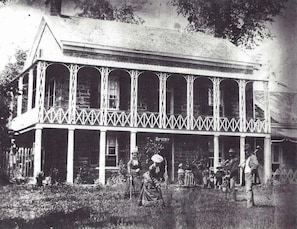 Circa 1880, National Archives photo of the Teskey family playing croquette on the front lawn