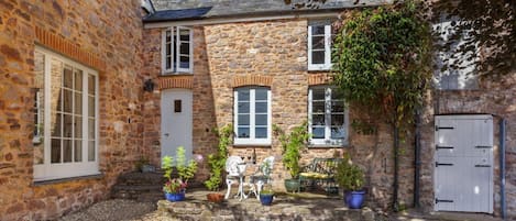 The cottage adjoins the owners' farmhouse