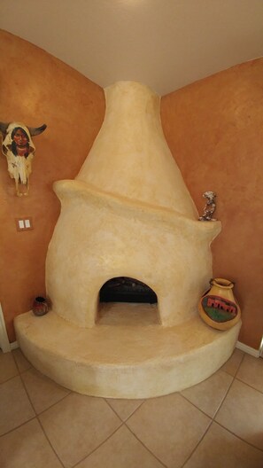 Kiva style electric fireplace