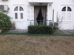 Patio leading to garden and beach