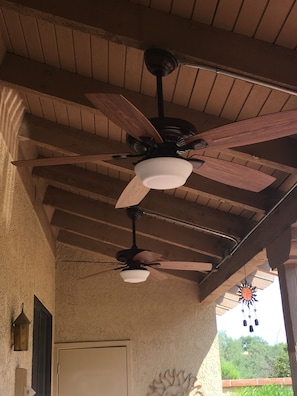 lighted outdoor fans to make the patio even more enjoyable. 