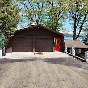 Upper driveway. It curves down to the right, to main house entry & more parking.