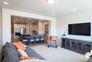 Living Room View of Kitchen - The Living Room is conveniently located adjacent to the Kitchen and Dining Table and is a great place for entertaining guests during downtime.