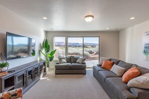 Living Room View of Golf Course - The living room has a beautiful view of The Ledges Golf Course.