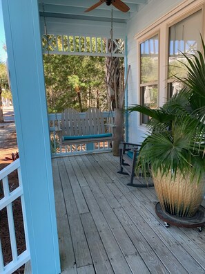 The front porch is a great place to sit with a cold drink and a good book.