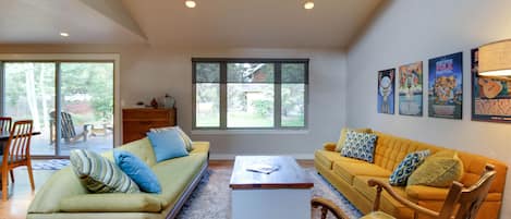 The gorgeous living room is filled with light and plenty of room for socializing