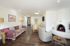 Living room with Kiva wood burning fireplace