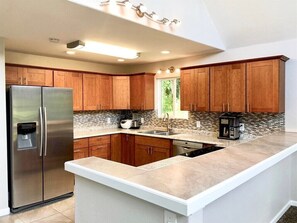 Newly remodeled kitchen with stainless steel appliances