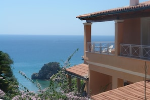 Terrace, overlooking the sea.