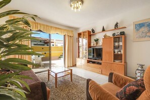 Lounge with patio doors to terrace