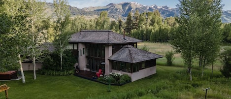 Ariel view of the house next to the Snake River on 12 acres of land.