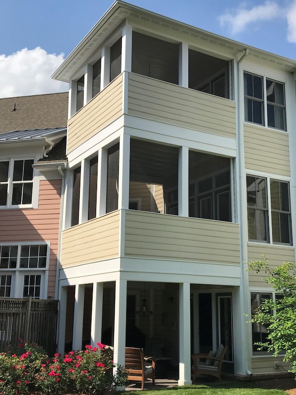 Two screened-in porches (dining and sleeping porches) and patio off back of home