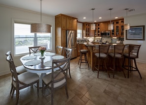 Dining table and kitchen from front door