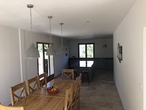 Kitchen, dining space. Access to pool and outside dining area. 
Beautiful views 