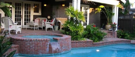 Your vacation paradise with hot tub, heated pool, outdoor dining & grill