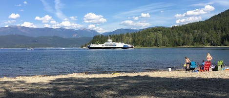 Our beach and the ferry going by.