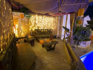 Harem seating area above jacuzzi grotto