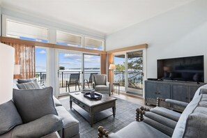 Living Room with Breathtaking Views at 1883 Beachside Tennis