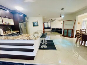 Kitchen, dining and one of the two living areas