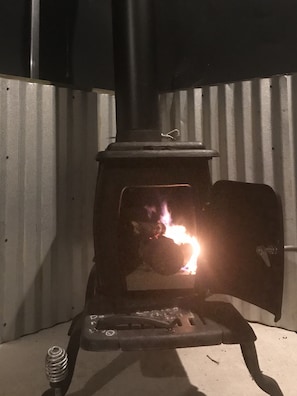 Stove is ready to warm you on the dock.