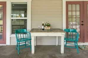 Enjoy a meal or a refreshing drink on the front porch