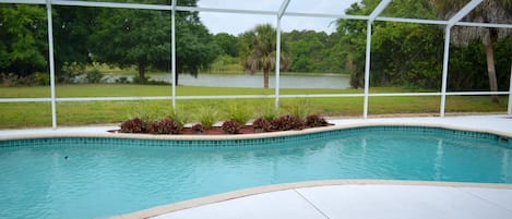 Heated Pool over looking pond.