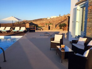 Sunbathing area and one of the outdoor seating areas