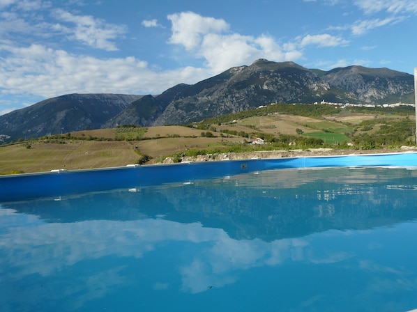 Autumnal view from our pool, with the Maiella mountains in the background. 