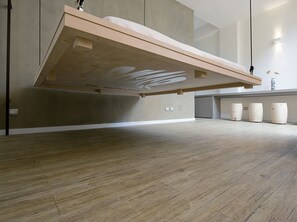 The pulley bed when it comes down from the ceiling, as if it were an elevator.