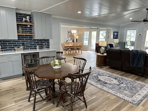 Open living area opens to porch with incredible lake views!