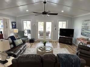 Open living area opens to porch with incredible lake views!