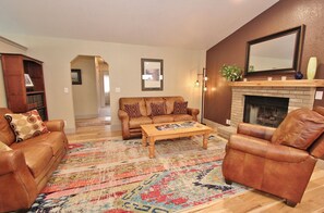 Gather by the fireplace.