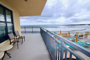 Attached side balcony overlooking pool and hot tub