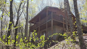 Buck's rear porches face creek