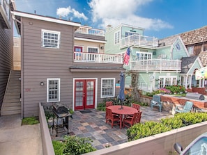 Lots of patio space to relax & a BBQ grill