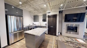 Kitchen with marble countertops and spacious center island