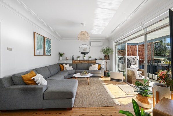 Downstairs living room with smart TV and Netflix.