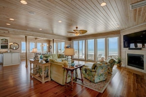 Beautiful main living room, with ocean view, 70" TV, fireplace and bar