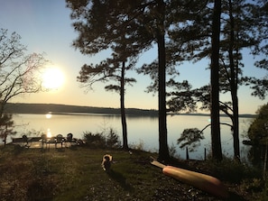 Western sunset on lake Wateree with firepit and flagstone patio