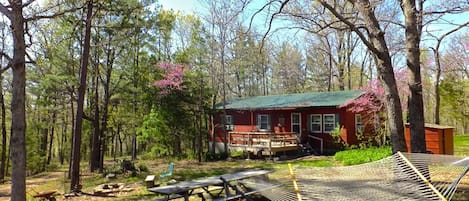 Cottage secluded on a bluff above the river.  This is a place you'll discover.