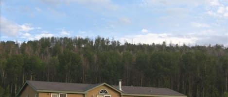 Aspen Hills Retreat surrounded by forest of Aspen and Pine.