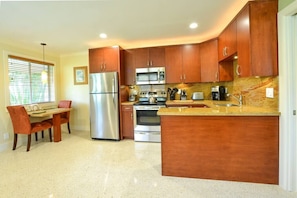 Kitchen has Granite counters and Stainless appliances