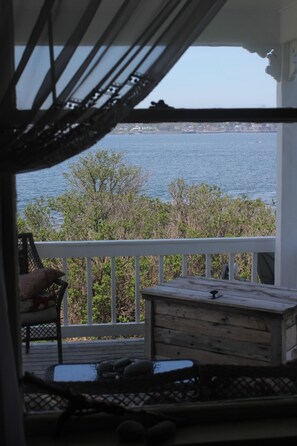 From living room window you are looking over deck.