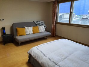 Master bedroom has sofa bed