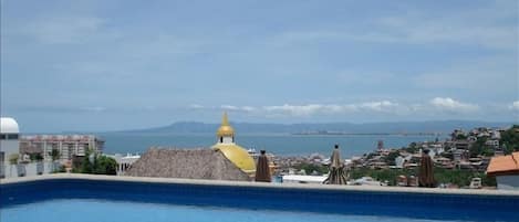 Amaizing view from the sun deck with pool in front of you condo/house