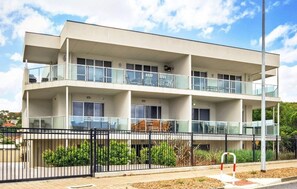 Sleeps up to 10 guests across 3 bedrooms (2 queen beds + 2 tri bunks), ideal for families or friend groups.