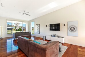 This flexible, family-friendly beach house comfortably accommodates up to 12 guests