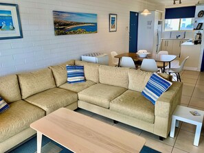 Interior features updated furnishings including 6 new dining chairs, coffee tables, and a Delonghi coffee machine with complimentary pods